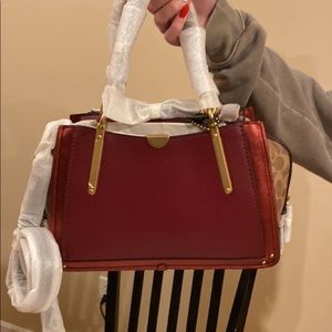 Brand new coach bag with tags.